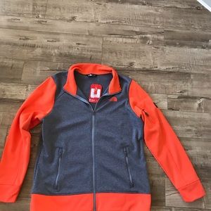 North face women’s grey and orange jacket